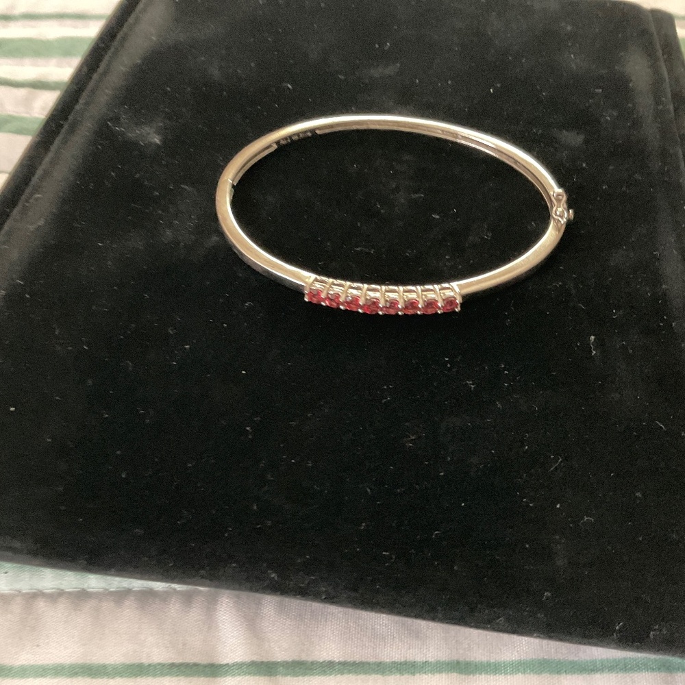 Ladies Sterling silver and red garnets channel bangle bracelet